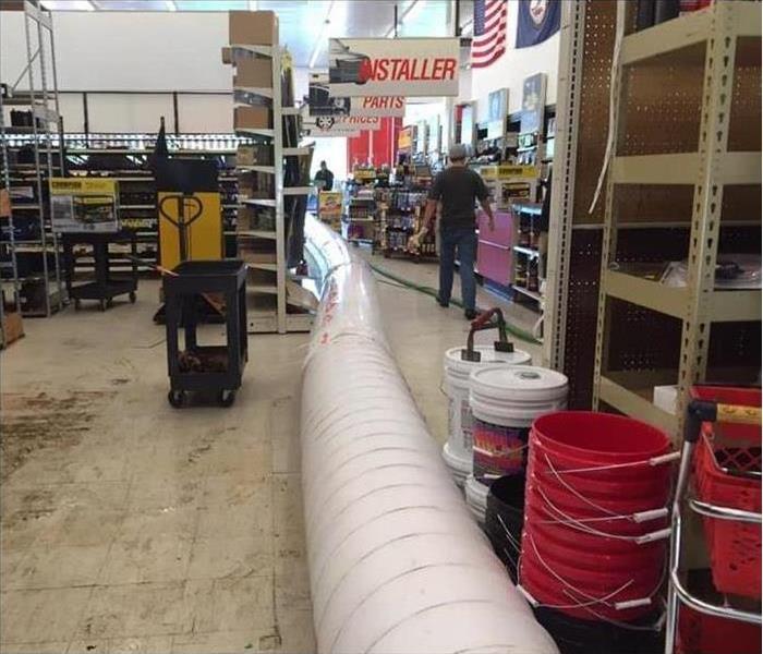 shelving red buckets white air tunnel