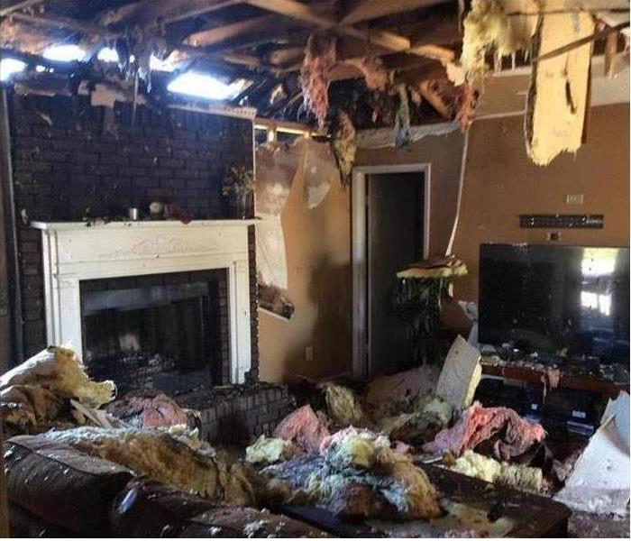 house with the ceiling damaged from fire