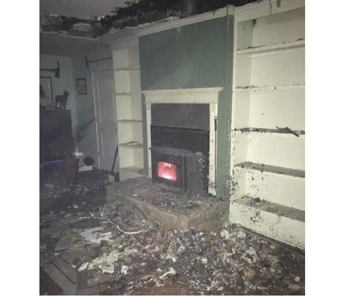 Home, fire place with fire damage